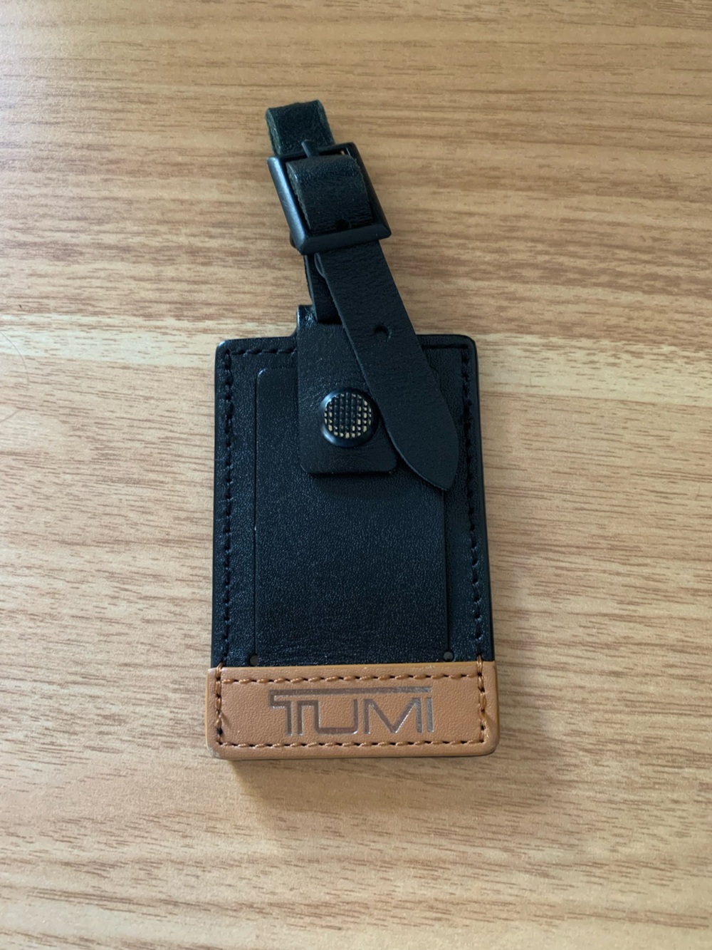 Tumi luggage tag